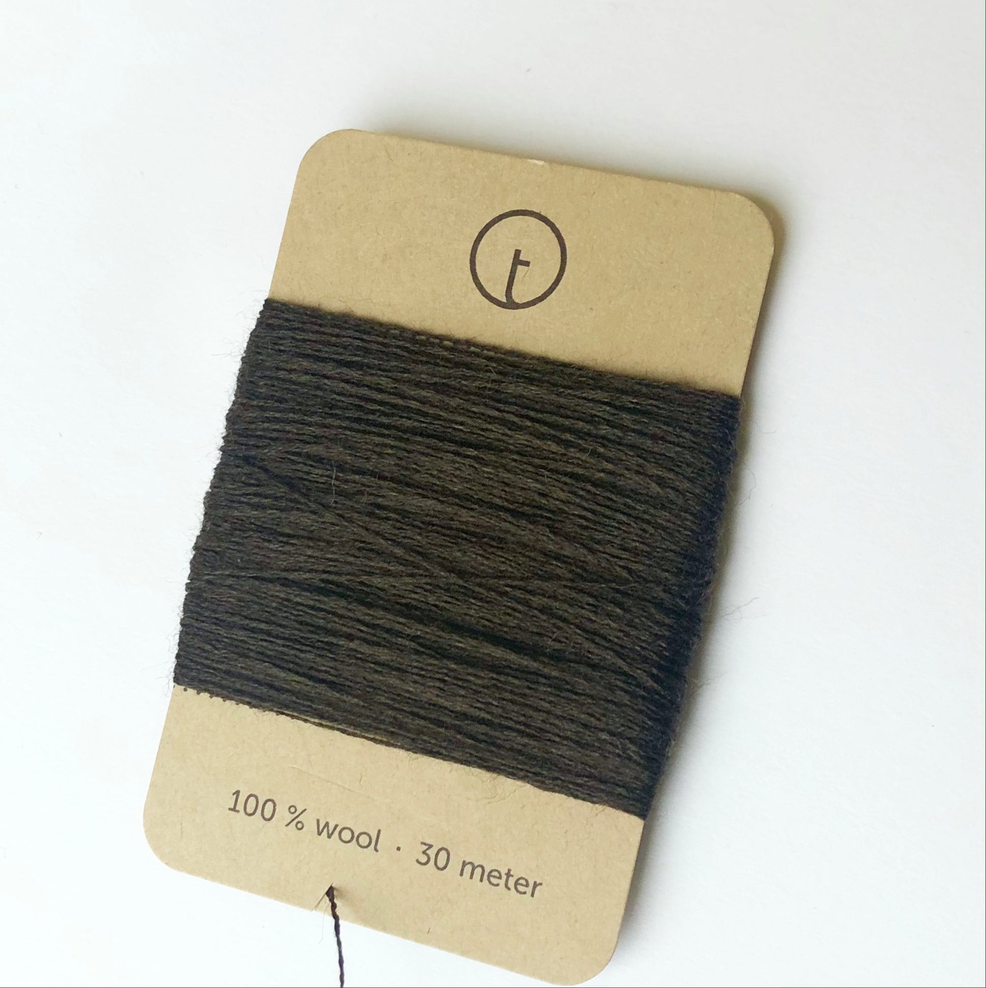 A 30-meter card of 100% wool darning yarn in dark brown colour, neatly wound and ready for mending knit garments. The yarn is packaged in a small, eco-friendly parchment paper bag.
toolly offers darning yarns in 9 essential colours. They are 100% pure wool without any artificial fiber. 30 meter yarn is wound around kraft paper card. Set of 3 colours, 6 colours and a color sample card can be also purchased.