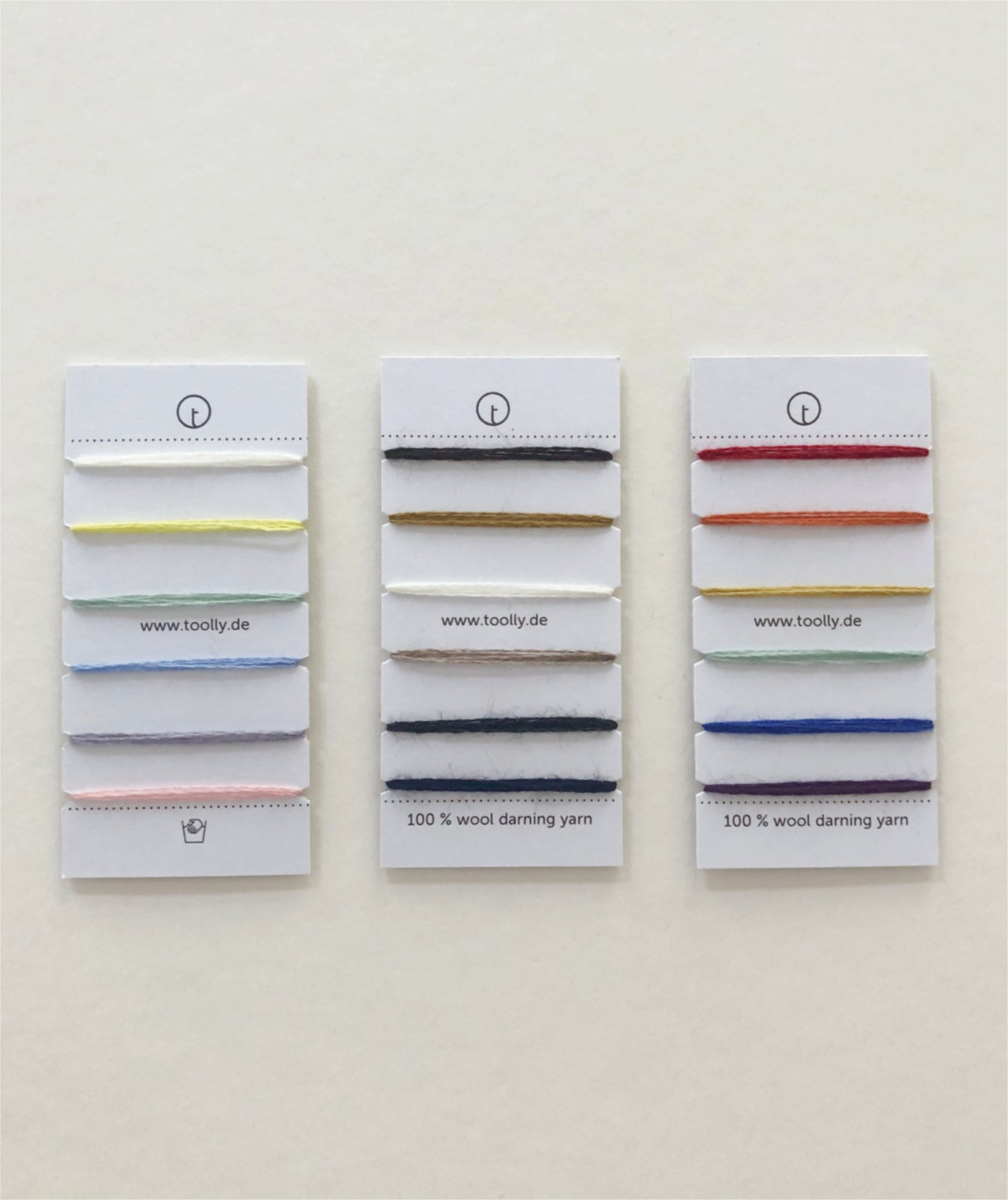 100% Wool Darning Yarn Colour Cards showing pastel, neutral, and vibrant shades for mending, embroidery, and decorative stitching.