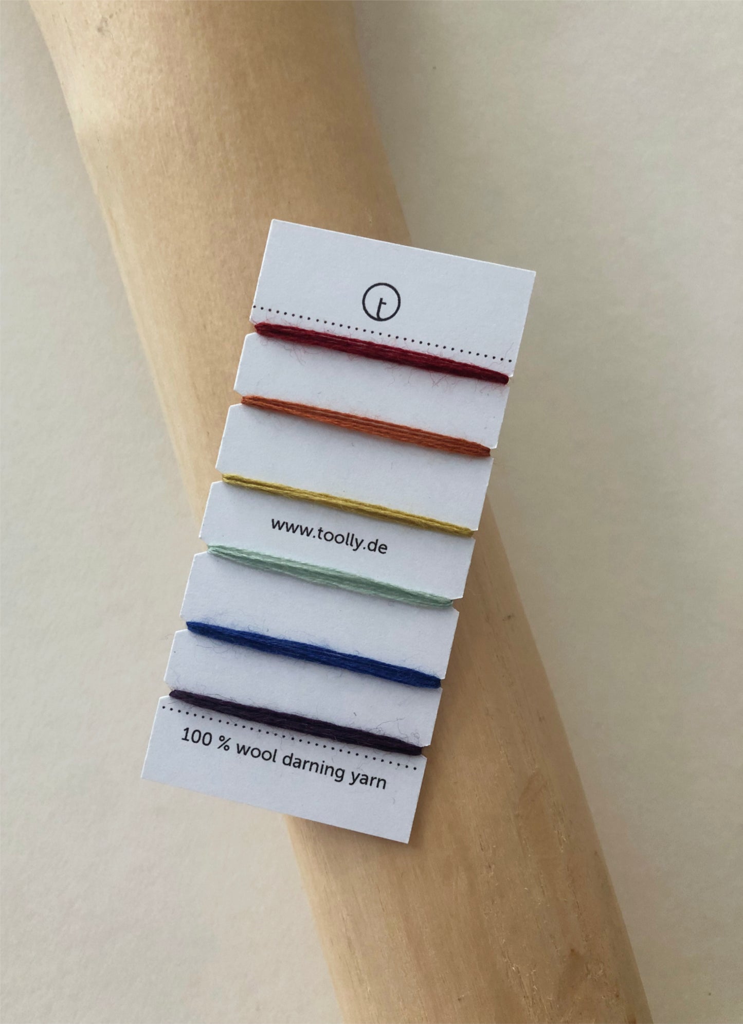 100% Wool Darning Yarn Colour Cards showing pastel, neutral, and vibrant shades for mending, embroidery, and decorative stitching.