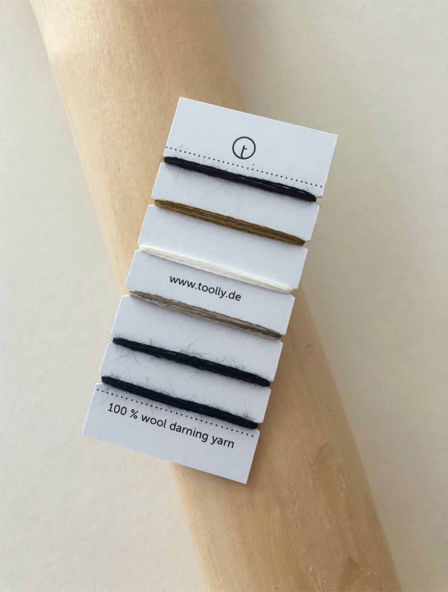 100% Wool Darning Yarn Colour Cards showing pastel, neutral, and vibrant shades for mending, embroidery, and decorative stitching.