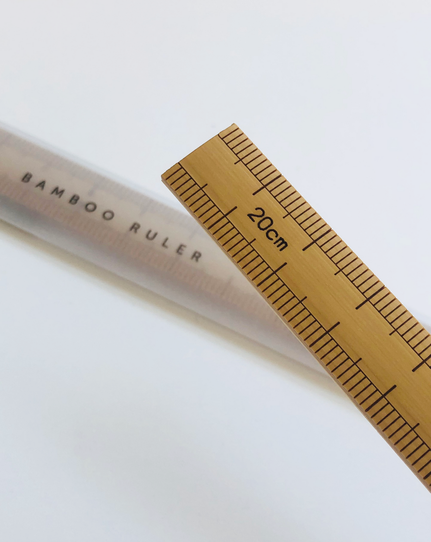 20cm bamboo sewing scale with engraved markings, made in Japan from 100% Japanese bamboo; compact, lightweight, and ideal for precise measurements near a sewing machine.
