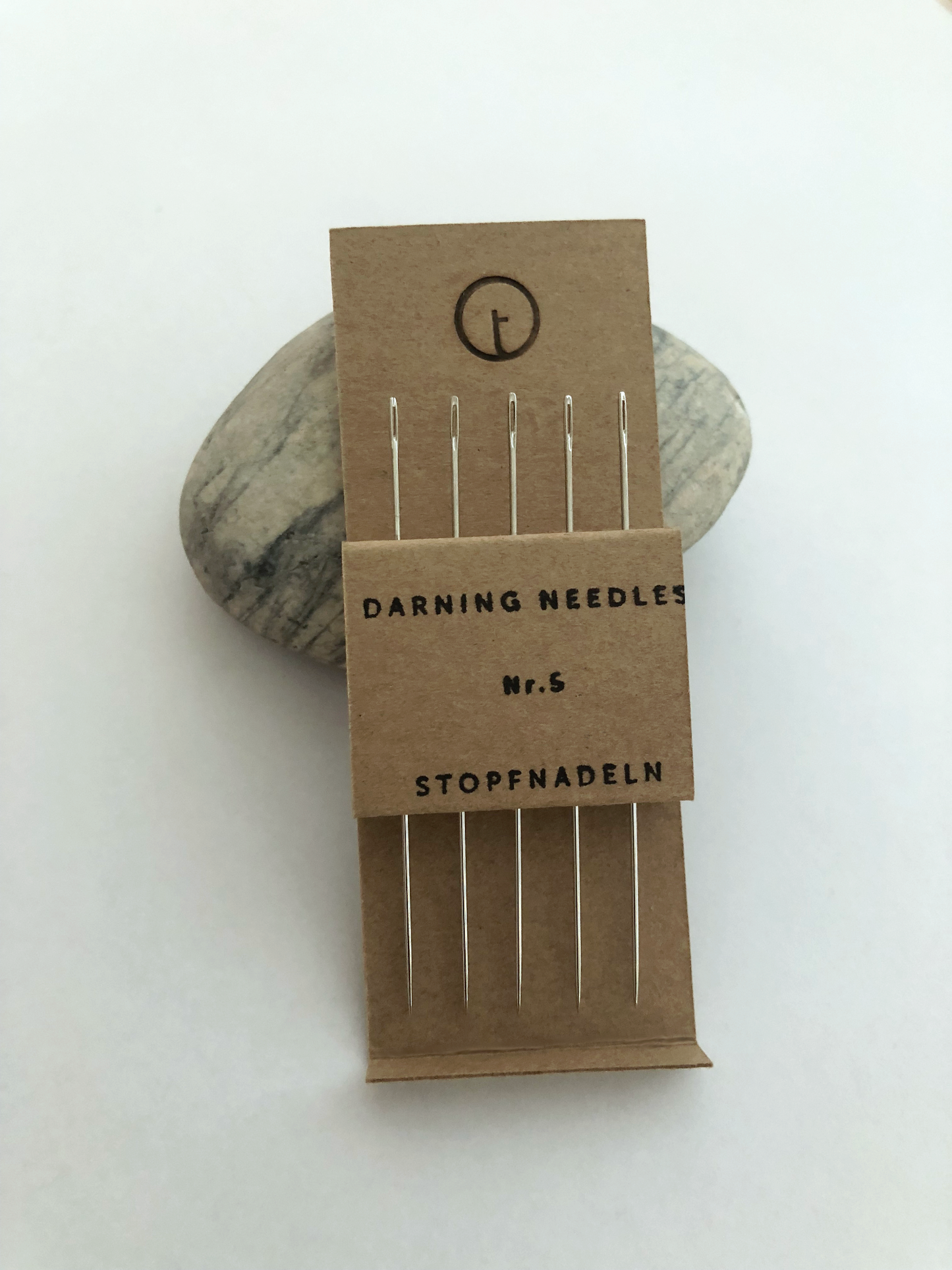 These extra-long needles, known as "long darners," are ideal for running stitches, mending, basting, and darning, with a sharp point perfect for layering fabrics during quilting and an elongated eye that makes threading thicker threads or yarns effortless.