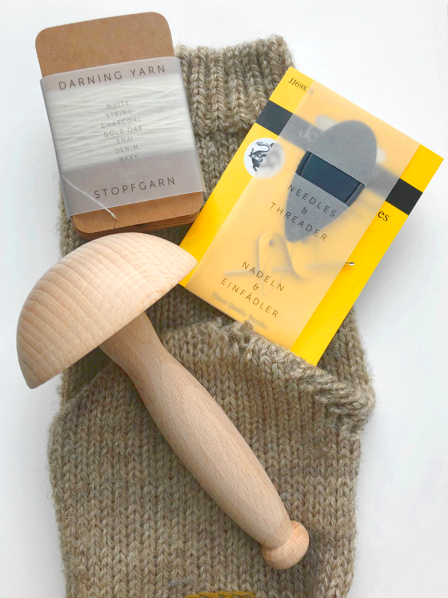 Super practical all-in-one darning set contains a darning mushroom, 2 darning needles in size 16 & 18, a needle threader and 6 colours of 100% wool darning yarns.
Perfect for mending wool garment like sweaters and socks.
#reapairkit #ecosewing