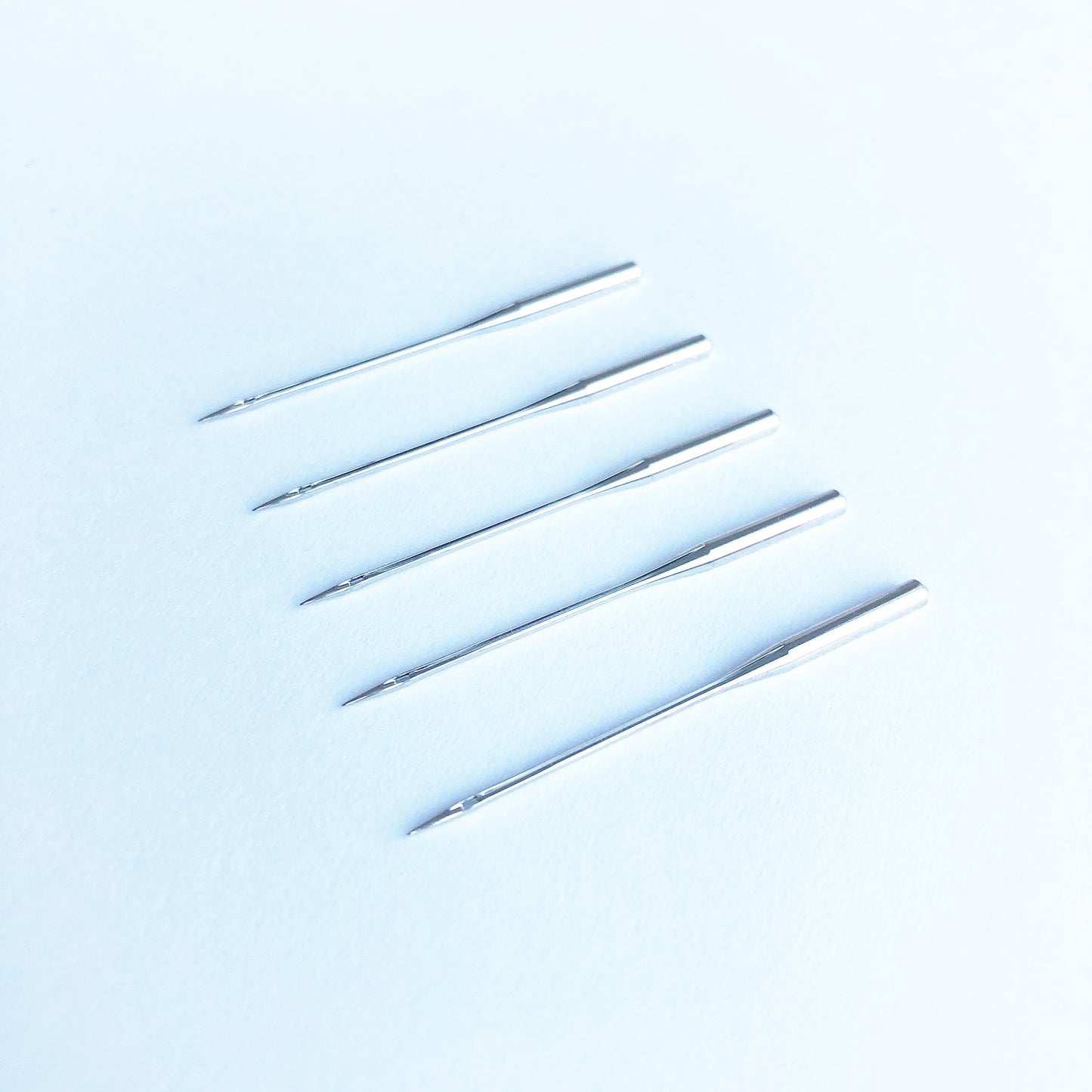 Organ sewing needles HA x 1 (130/705H), size 12/80, pack of 5. Ideal for general-purpose sewing on medium-weight woven fabrics. Compatible with most home sewing machines including Brother, Singer, Janome, and more.