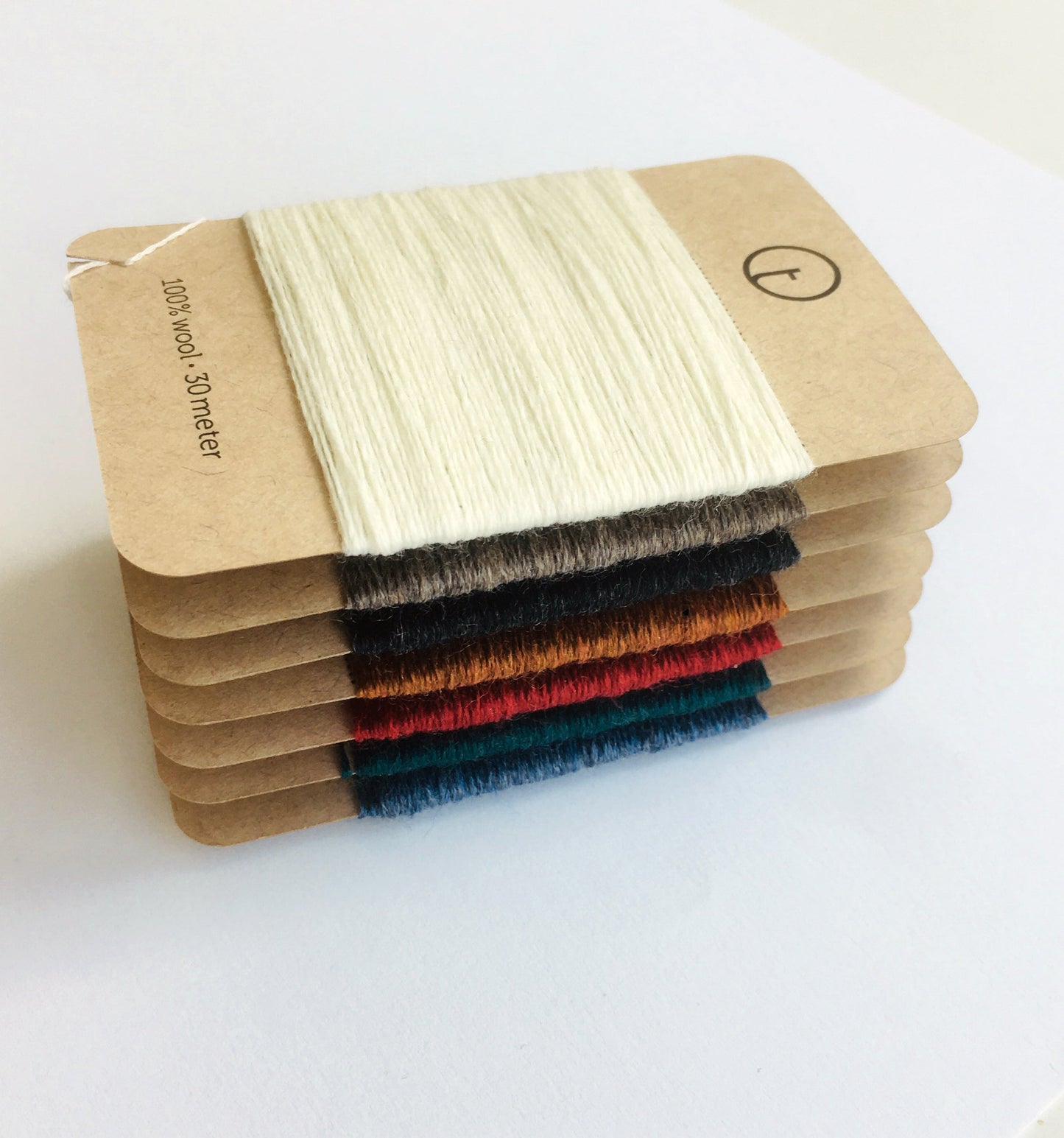 toolly offers darning yarns in 9 essential colors. They are 100% pure wool without any artificial fiber. 30 meter yarn is wound around kraft paper card. Set of 3 colors, 7 colors and a color sample card can be also purchased.