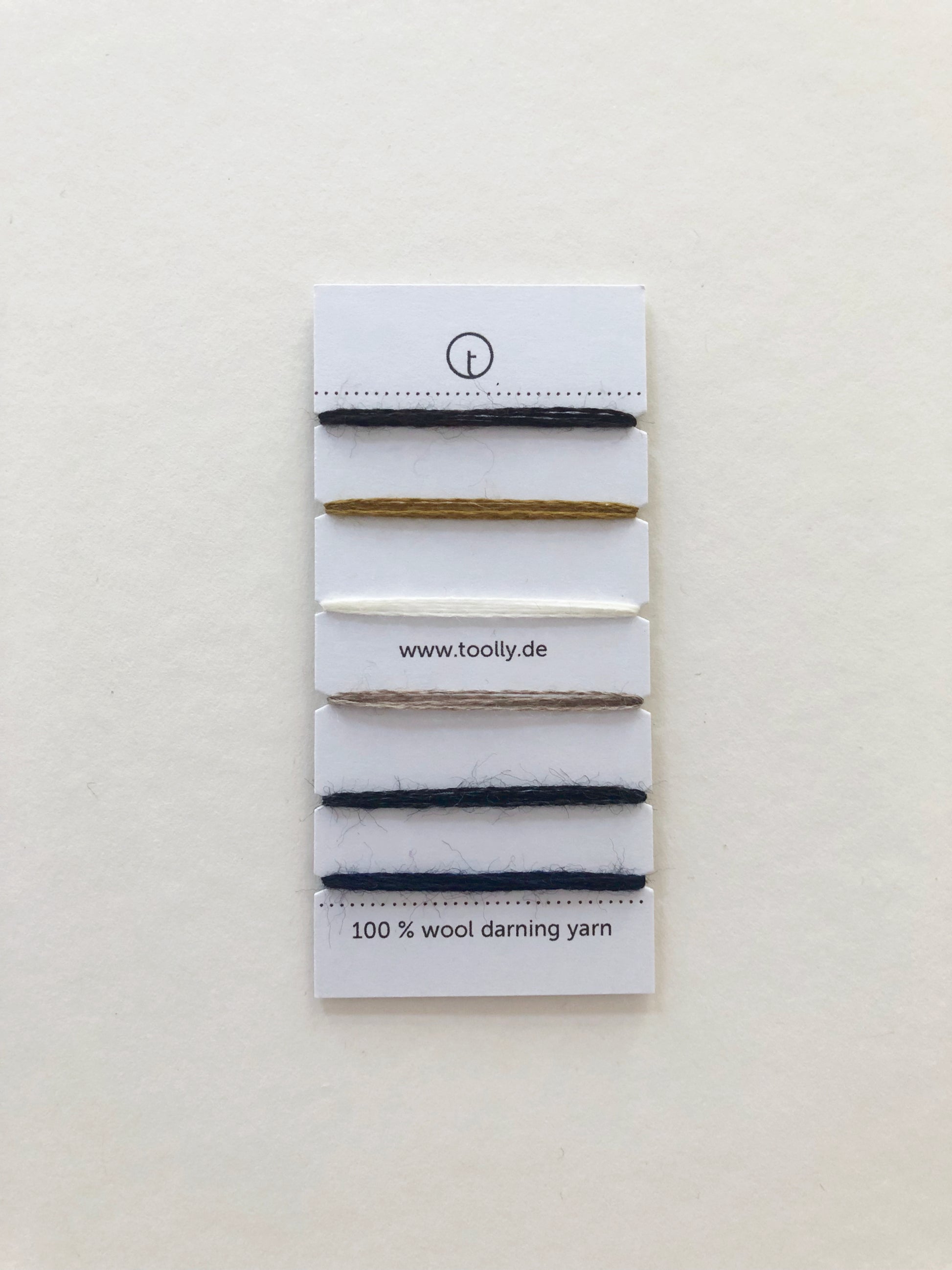 100% Wool Darning Yarn Colour Cards showing pastel, neutral, and vibrant shades for mending, embroidery, and decorative stitching.