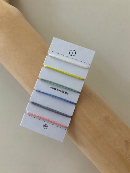 100% Wool Darning Yarn Colour Cards showing pastel, neutral, and vibrant shades for mending, embroidery, and decorative stitching.