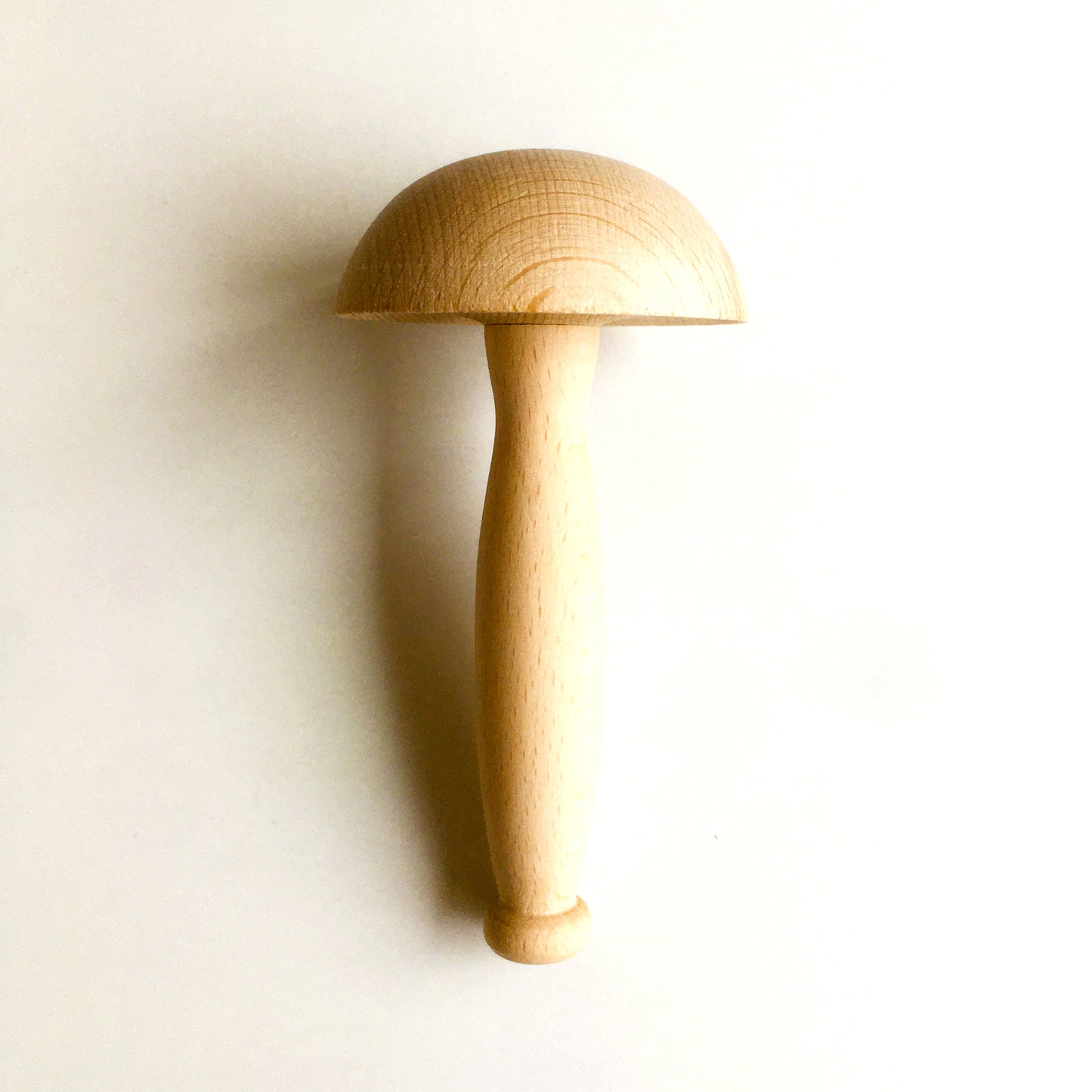 Organic shaped darning tool. Darning mushroom makes it easier to repair a hole in clothes. Darning egg is also available at toolly.