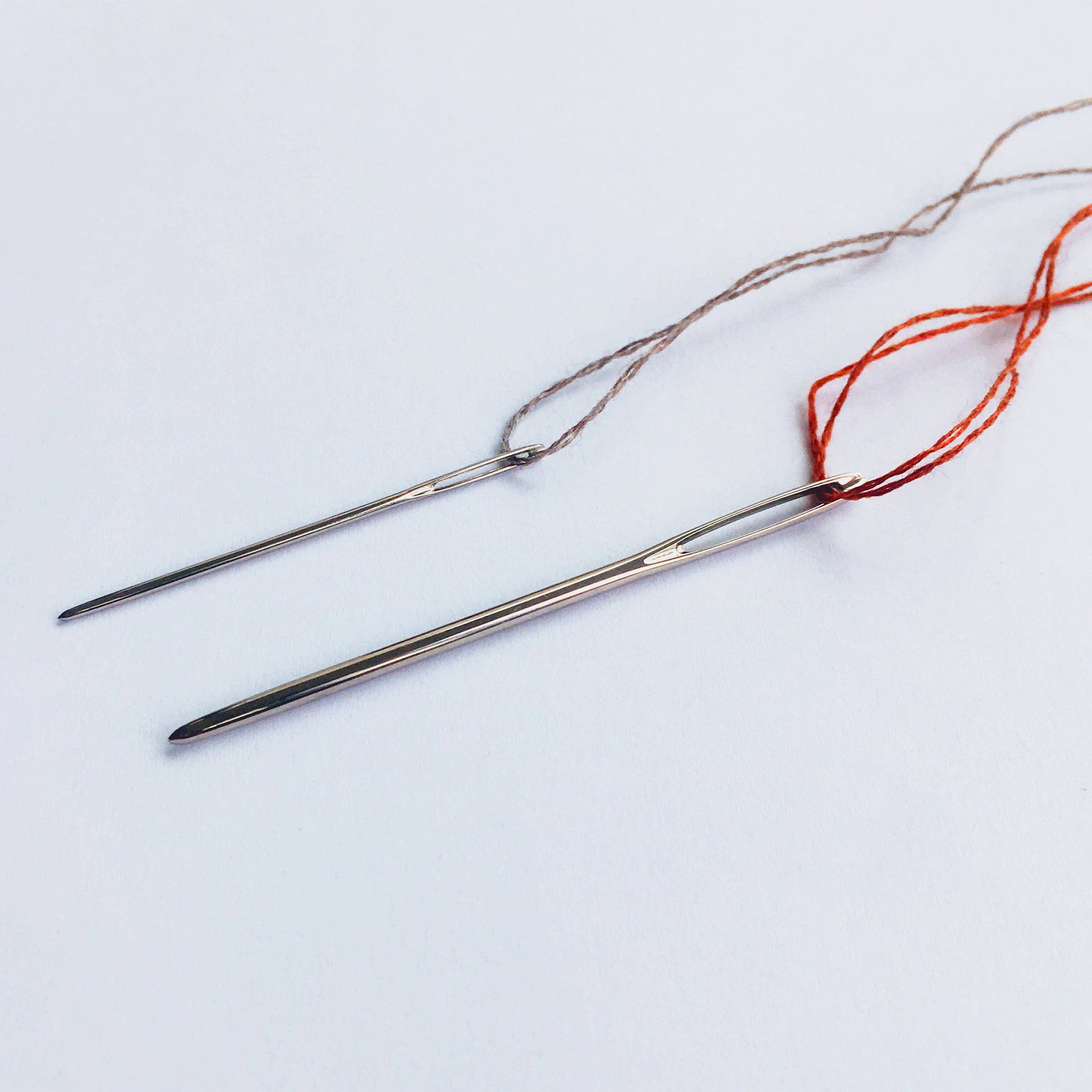 2 Darning needles in 2 sizes. Round tip knitter's needles. Perfect for darning with wool darning yarns.